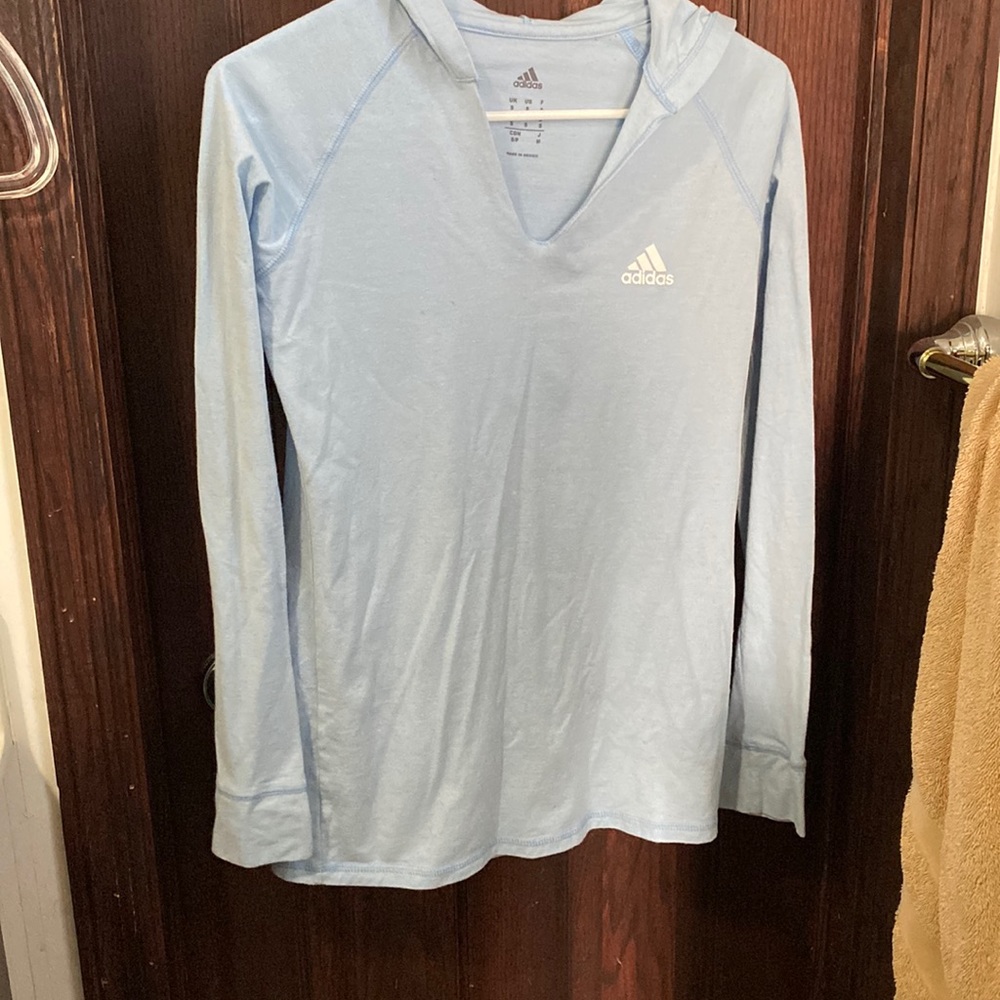 Light blue hooded adidas long sleeve work out shirt size S.